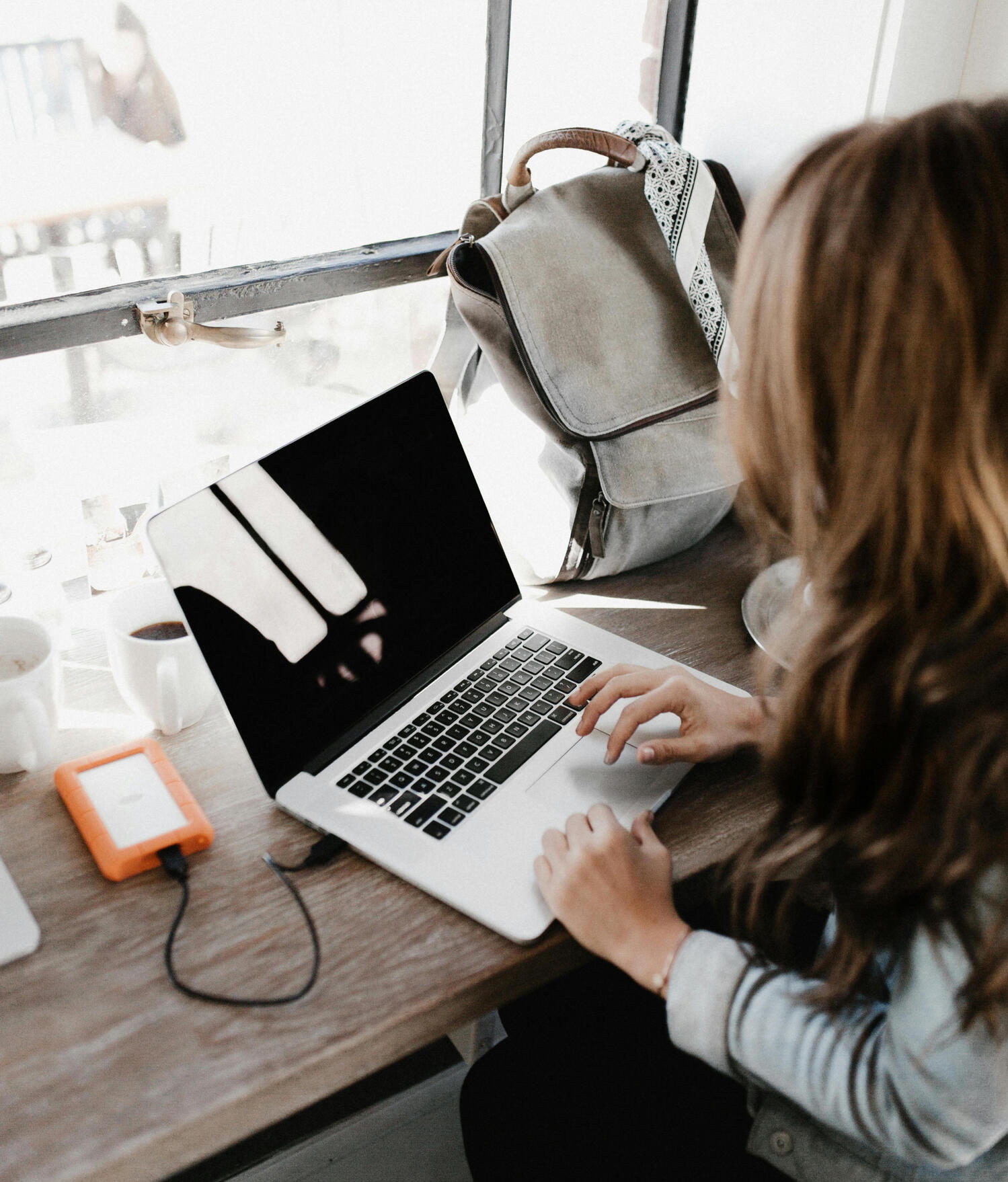 a woman working on a laptop